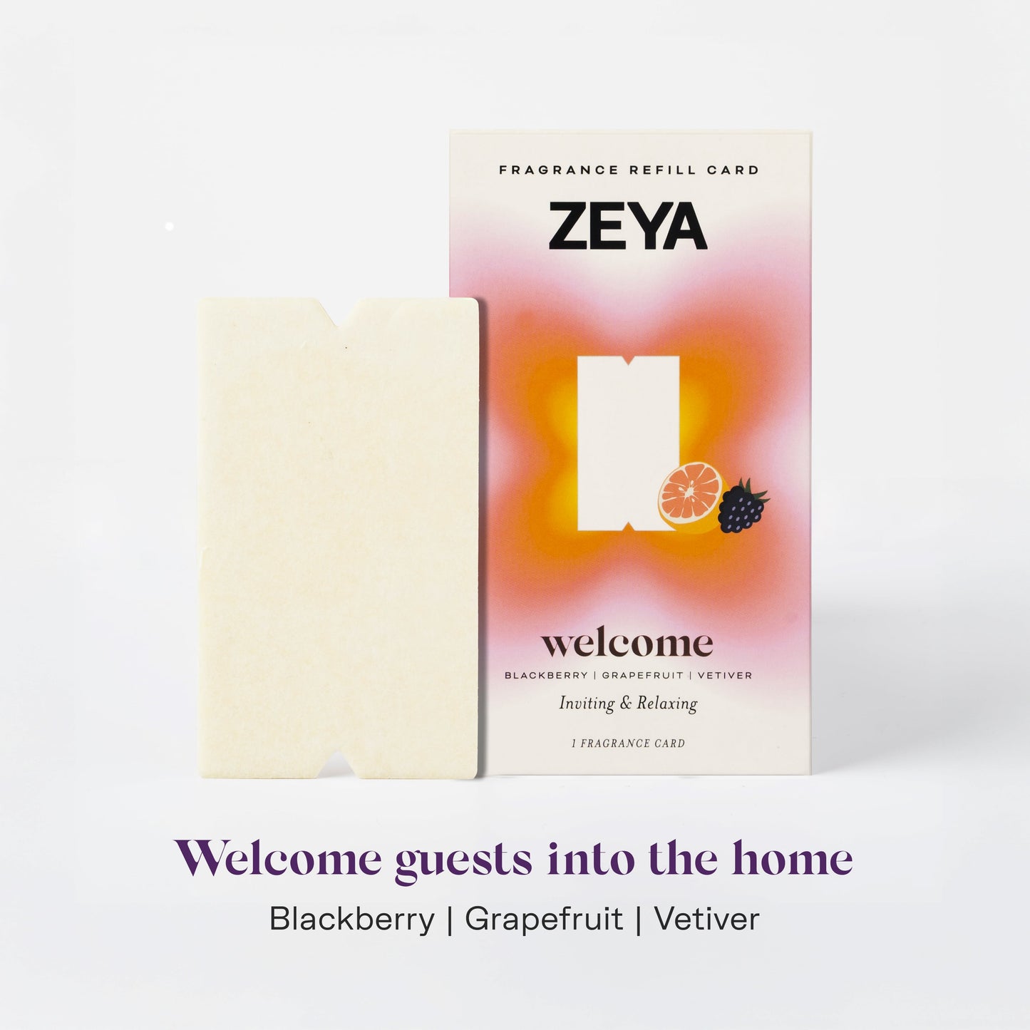 A ZEYA fragrance card pack with the text 'Stimulate conversation and creativity' on the front. The card holder is yellow, and the packaging has a blue and green design with the ZEYA brand logo and the words 'Mint | Bergamot | Amber | Suede' indicating the scents.